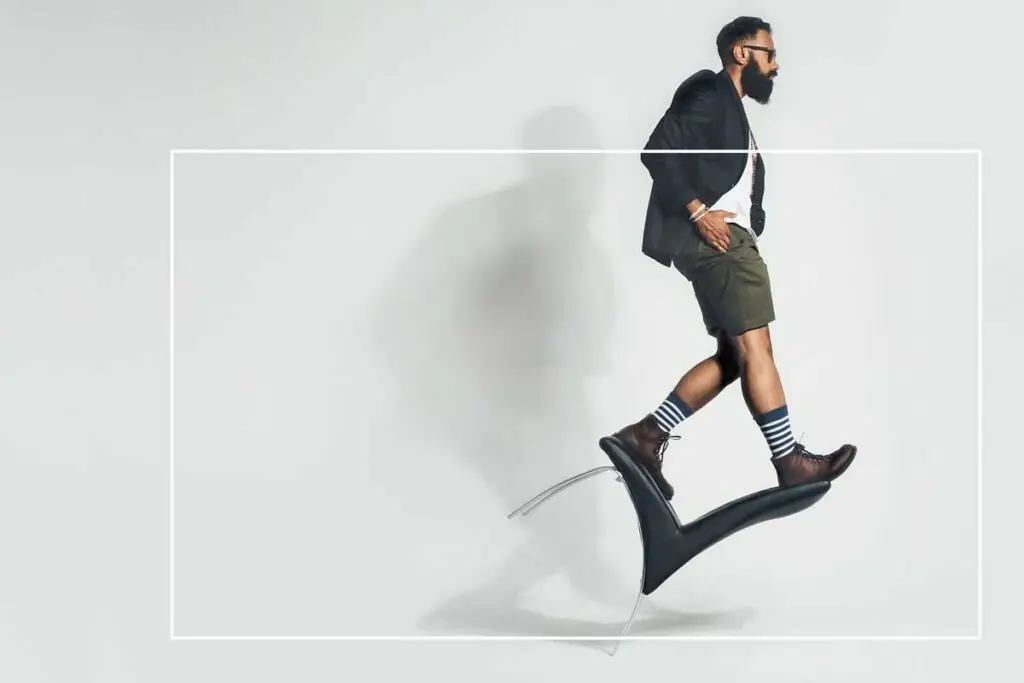 Men walking over a checklist mark